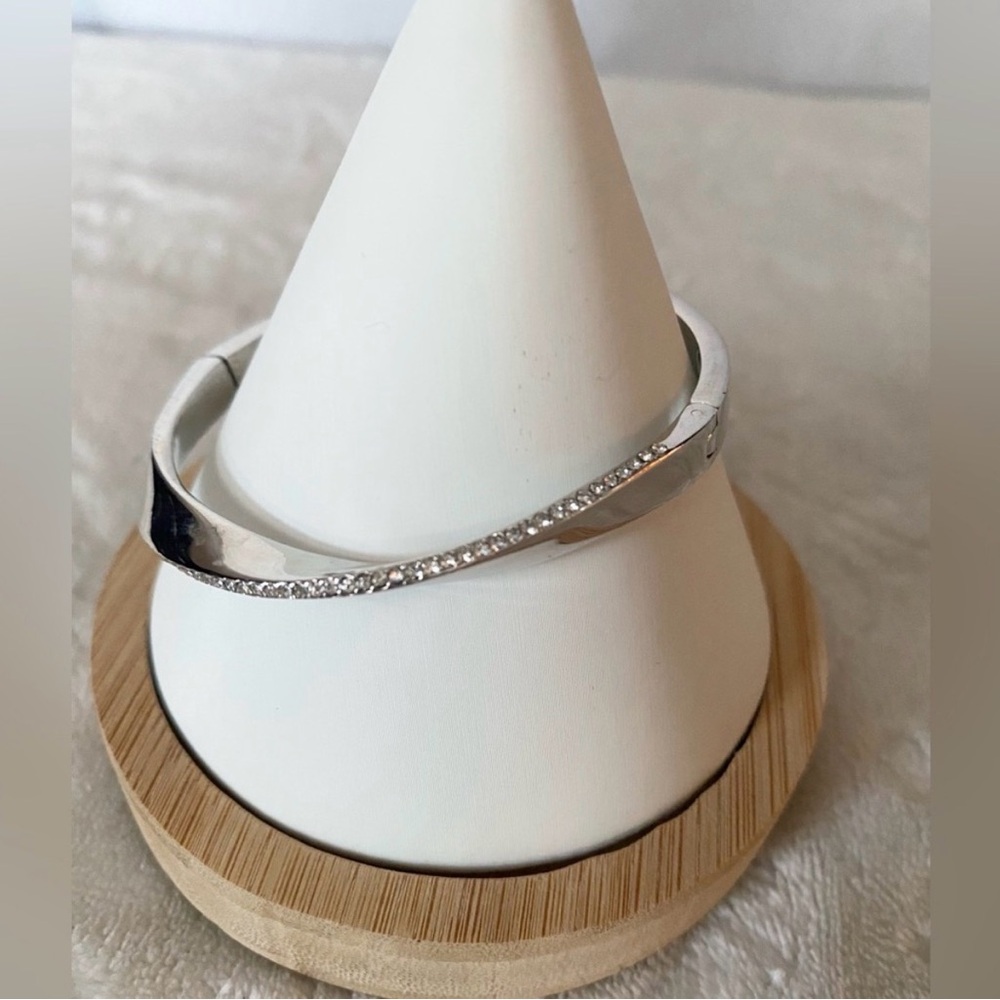 Kate Spade twisted rhinestone silver hinge bracelet